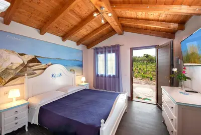 Letto o letti in una camera di Hotel Rurale Orti di Nora & SPA