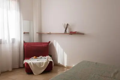 Letto o letti in una camera di Le Fontane Apartments In Villasimius