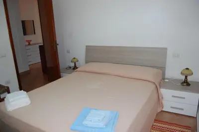 Letto o letti in una camera di Casa I Fichi