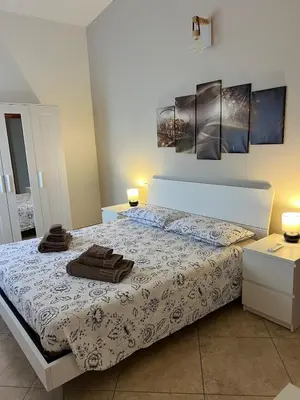 Letto o letti in una camera di La Quercia