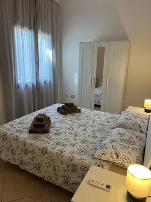 Letto o letti in una camera di La Quercia