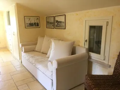 Area soggiorno di Sardegna - Villa Con Parco e Piscina a Carloforte
