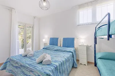 Letto o letti in una camera di Casa Mulas