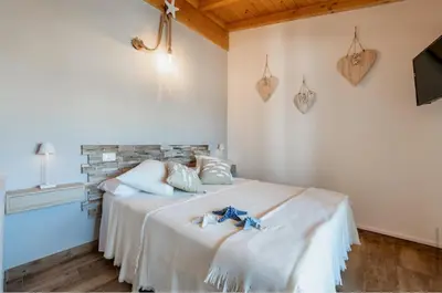 Letto o letti in una camera di CASA di FRANCY