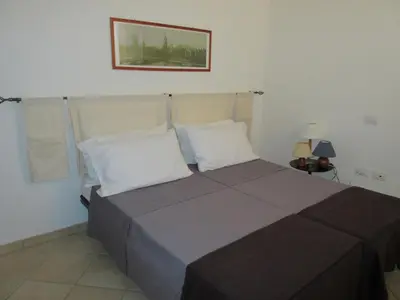 Letto o letti in una camera di Appartamento Enrica