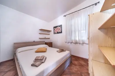 Letto o letti in una camera di Villa De Janas