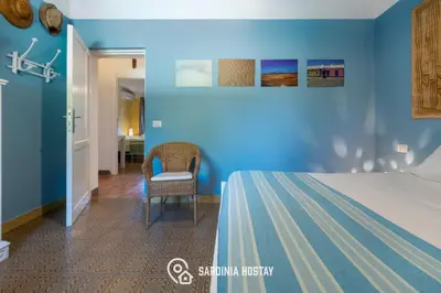 Letto o letti in una camera di Villa Luisa
