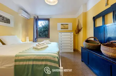 Letto o letti in una camera di Villa Luisa