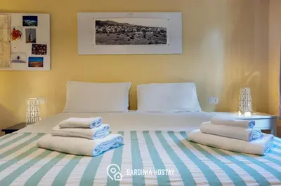 Letto o letti in una camera di Villa Luisa