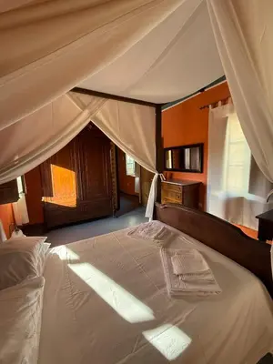 Letto o letti in una camera di Antica Dimora