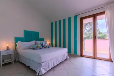 Letto o letti in una camera di Casa Pintada Porto Pino, 500 mt to beach SouthSardiniaHolidays