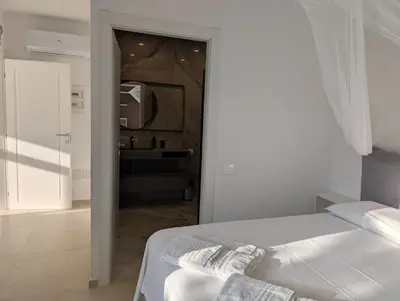Letto o letti in una camera di Villa Azzurra splendor