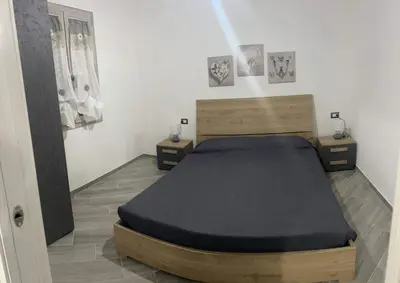 Letto o letti in una camera di Casa LUNA