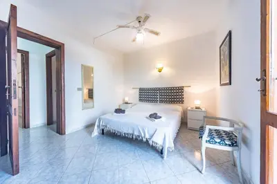 Letto o letti in una camera di Casa Luna