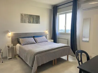 Letto o letti in una camera di BnB Brotzu