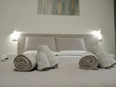 Letto o letti in una camera di BnB Brotzu