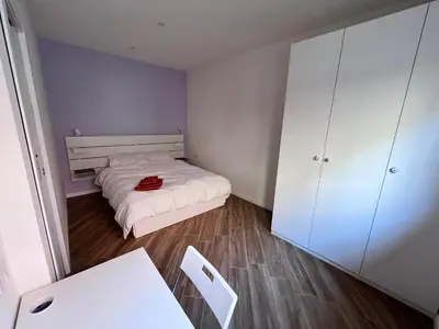 Letto o letti in una camera di Casa Daisy