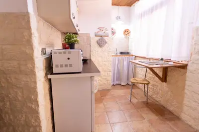 Cucina o angolo cottura di Domu de tuni' s'apposentu