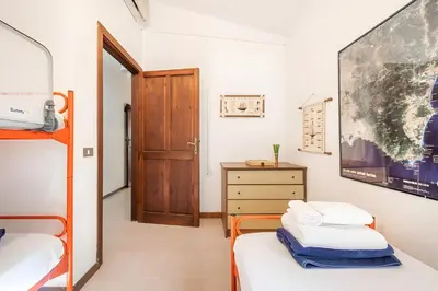 Letto o letti in una camera di Domus Bianca - Villasimius