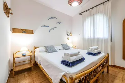 Letto o letti in una camera di Domus Bianca - Villasimius