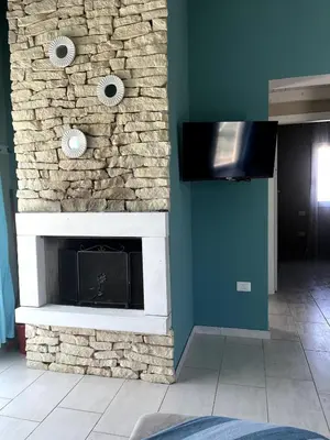 TV o dispositivi per l'intrattenimento presso VILLA AUREA Apartment in Castiadas