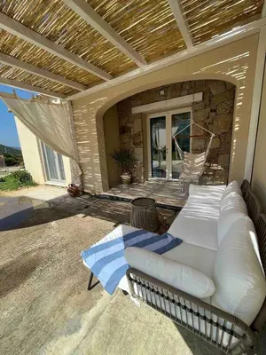 Area soggiorno di VILLA AUREA Apartment in Castiadas