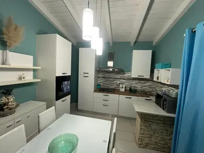 Cucina o angolo cottura di VILLA AUREA Apartment in Castiadas