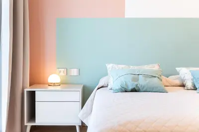 Letto o letti in una camera di Camere in villa da Anna, Poggio dei Pini