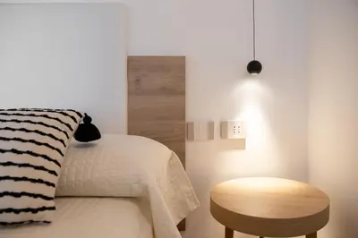 Letto o letti in una camera di Camere in villa da Anna, Poggio dei Pini
