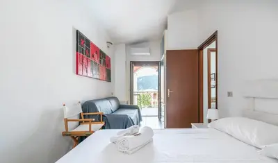 Letto o letti in una camera di Casa Azalea