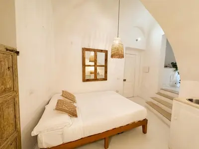 Letto o letti in una camera di Kalma - Genovesi mini house