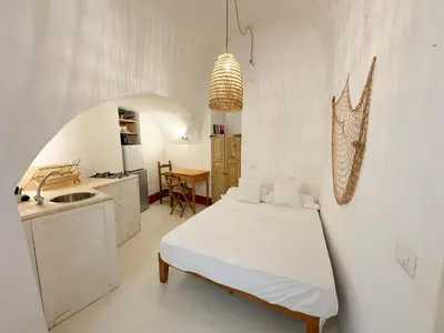 Letto o letti in una camera di Kalma - Genovesi mini house