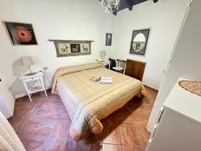 Letto o letti in una camera di Su Niu
