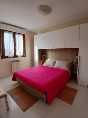 Letto o letti in una camera di Casa Dolce Paola