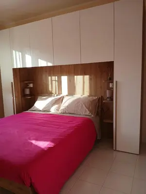 Letto o letti in una camera di Casa Dolce Paola