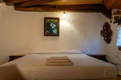 Letto o letti in una camera di Su Pinnettu Casa Vacanza