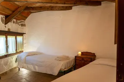Letto o letti in una camera di Su Pinnettu Casa Vacanza