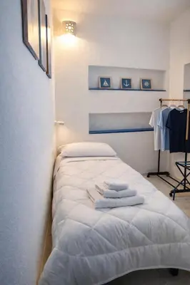 Letto o letti in una camera di Dimora sul Porto