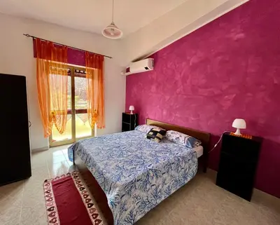 Letto o letti in una camera di Casa Claudia
