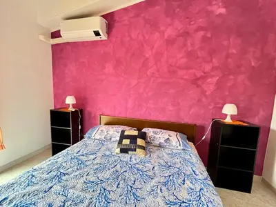 Letto o letti in una camera di Casa Claudia