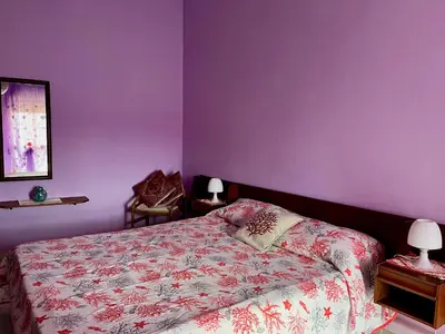 Letto o letti in una camera di Casa Claudia