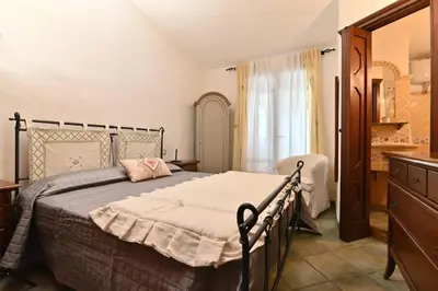 Letto o letti in una camera di Sea View Apartment in Sardegna - 90 m², 5 people