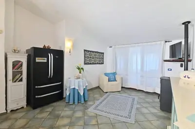 TV o dispositivi per l'intrattenimento presso Sea View Apartment in Sardegna - 90 m², 5 people