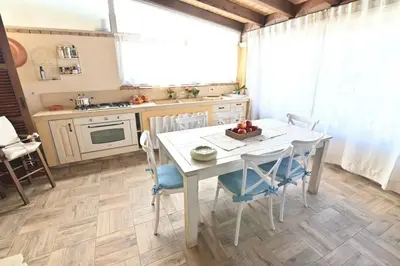 Cucina o angolo cottura di Sea View Apartment in Sardegna - 90 m², 5 people