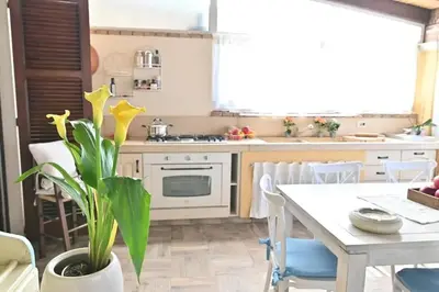 Cucina o angolo cottura di Sea View Apartment in Sardegna - 90 m², 5 people