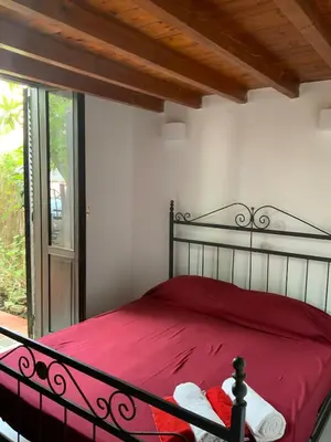 Letto o letti in una camera di Poetto Beach Cottage