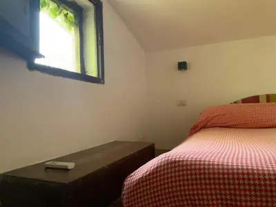 Letto o letti in una camera di Poetto Beach Cottage