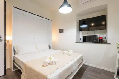 Letto o letti in una camera di Lumen City Vibes