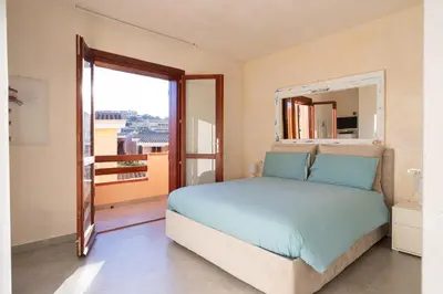 Letto o letti in una camera di Apartment Villasimius Rebecca House