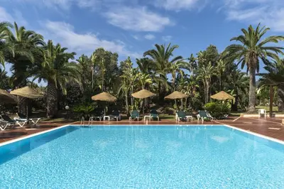 Piscina di Tropical Residence In Santa Margherita Di Pula o nelle vicinanze
